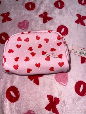 Pink cosmetic pouch